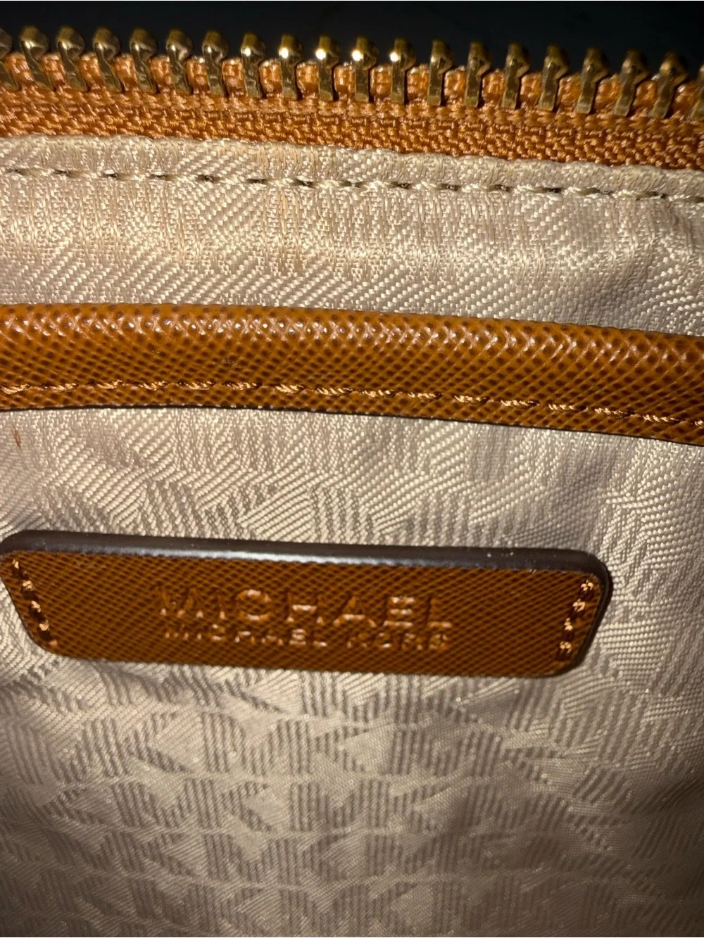 Michael Kors Beige MK Monogram clutch/wristlet with Brown Trim